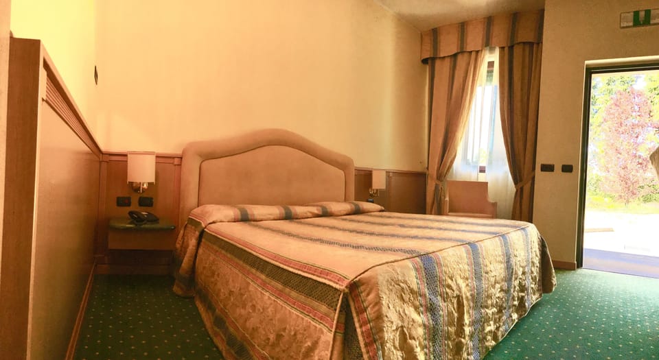 Down comforters, minibar, in-room safe, desk