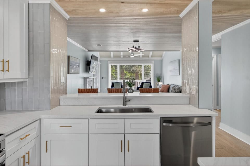 Cook, gather, and connect in this beautifully updated kitchen with sleek finishes and an open flow into the living space.
