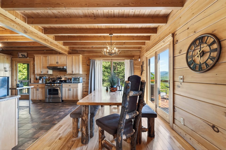 A handcrafted log dining set offers a true lodge experience for every meal.