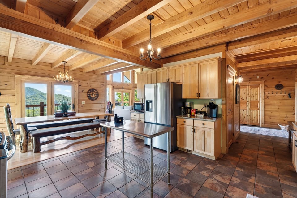 The open-concept kitchen flows seamlessly into the dining area, ideal for group entertaining.