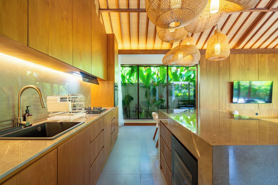Villa | Private kitchen | Microwave, stovetop, toaster, highchair