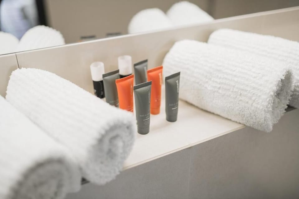 Bathtub, hair dryer, towels