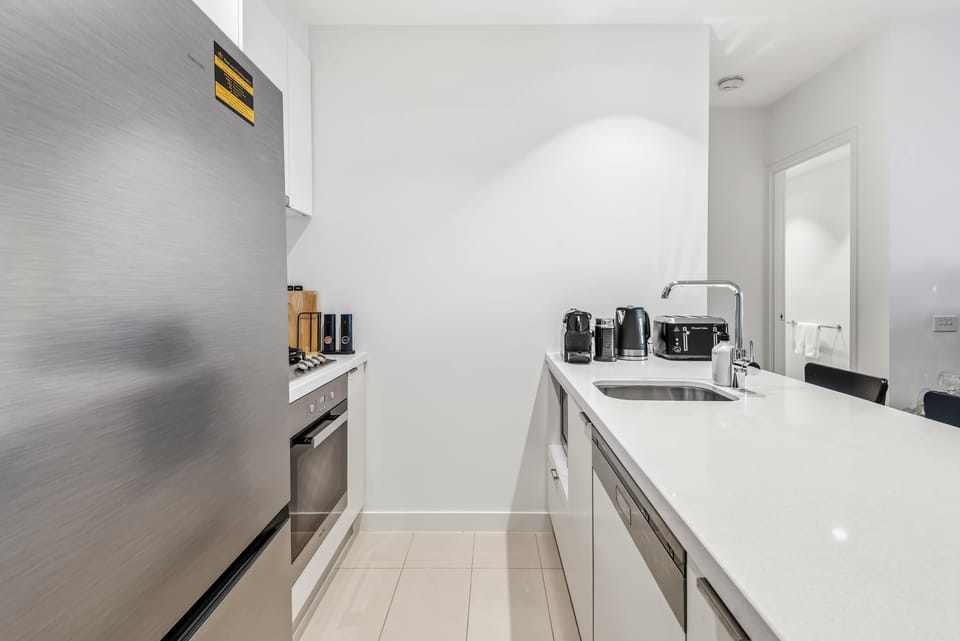 Clean, contemporary, and fully equipped — the perfect kitchen for a seamless stay.