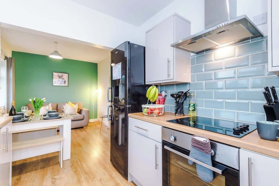 Fully equipped modern kitchen with all essentials for home cooking.