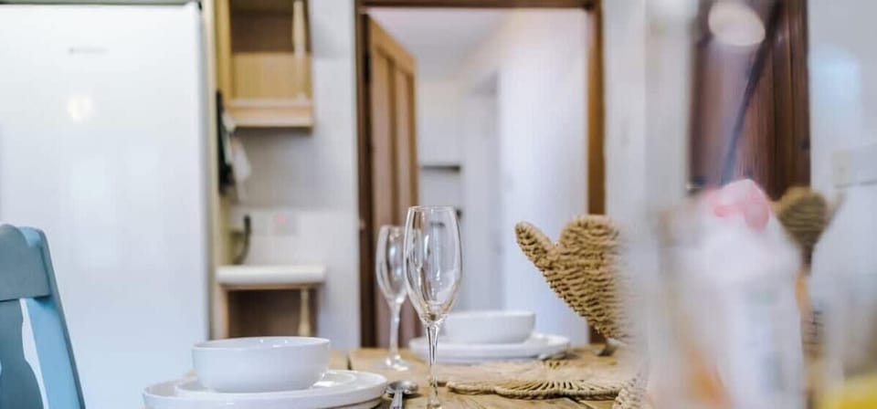 Spacious kitchen and dining area with rustic charm.
Fully equipped for cooking and perfect for shared meals.
Bright, homely space ideal for families and long stays.