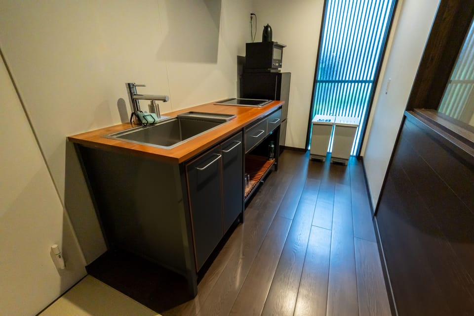 Villa | Private kitchen | Full-size fridge, microwave, cookware/dishes/utensils