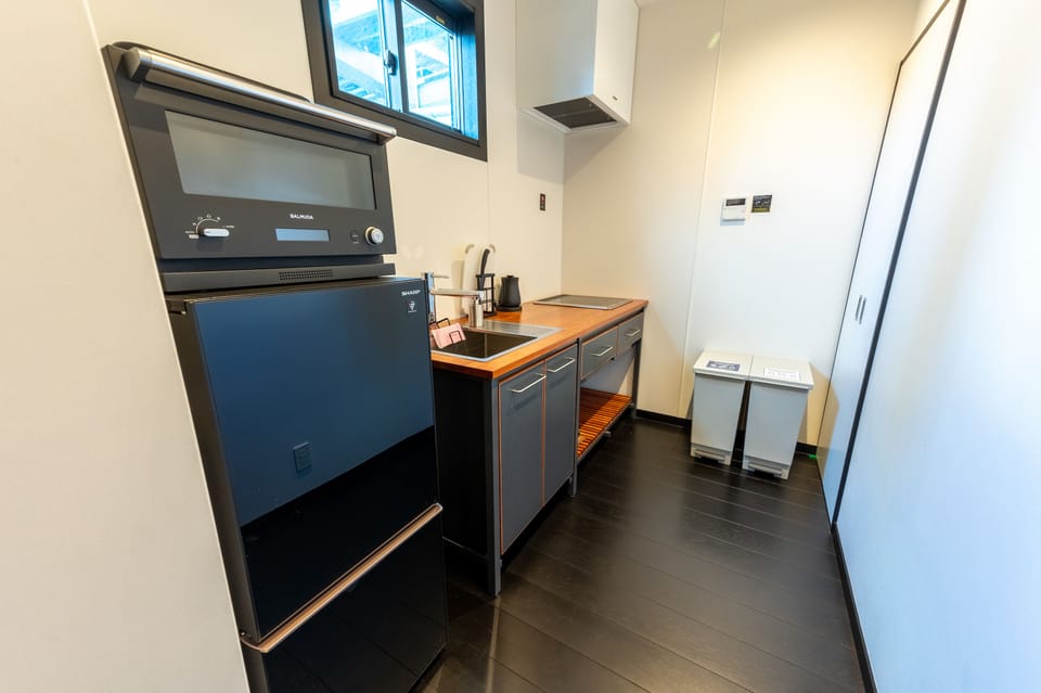 Villa | Private kitchen | Full-size fridge, microwave, cookware/dishes/utensils