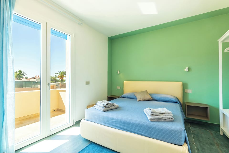 Double Room, Balcony, Sea View | Desk, laptop workspace, blackout drapes, iron/ironing board