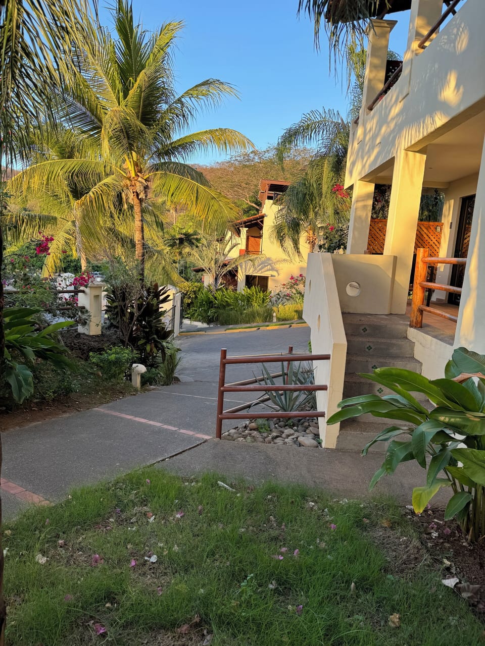 Slight inclined hill that leads to the main gate and about 5 steps to the unit