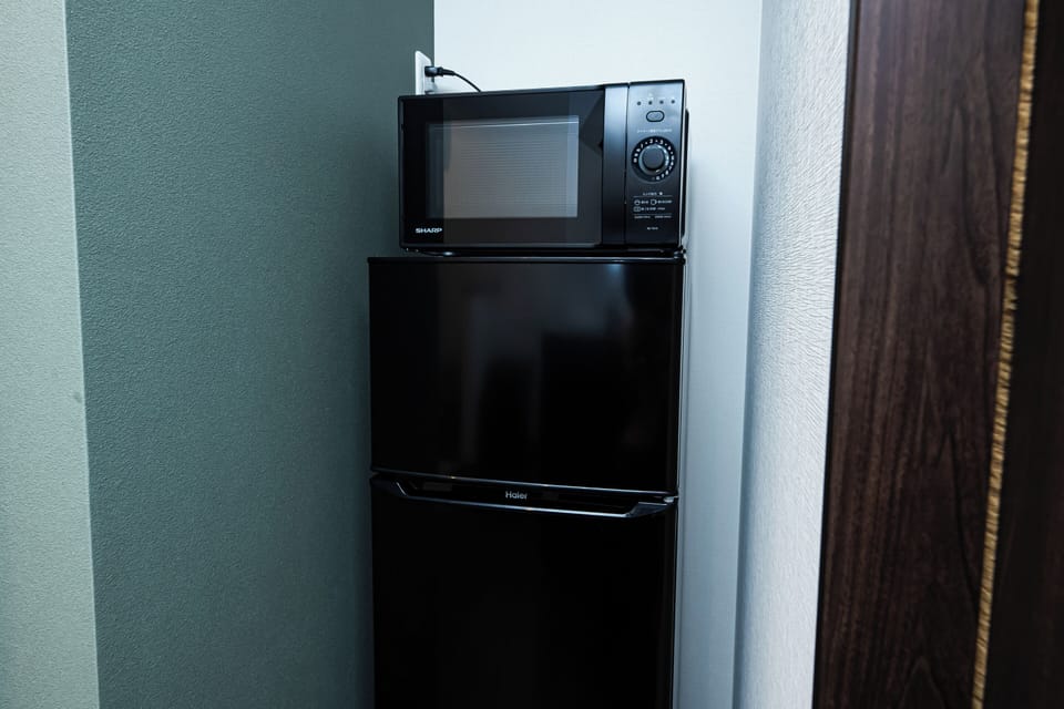 Villa | Private kitchen | Full-size fridge, microwave, cookware/dishes/utensils