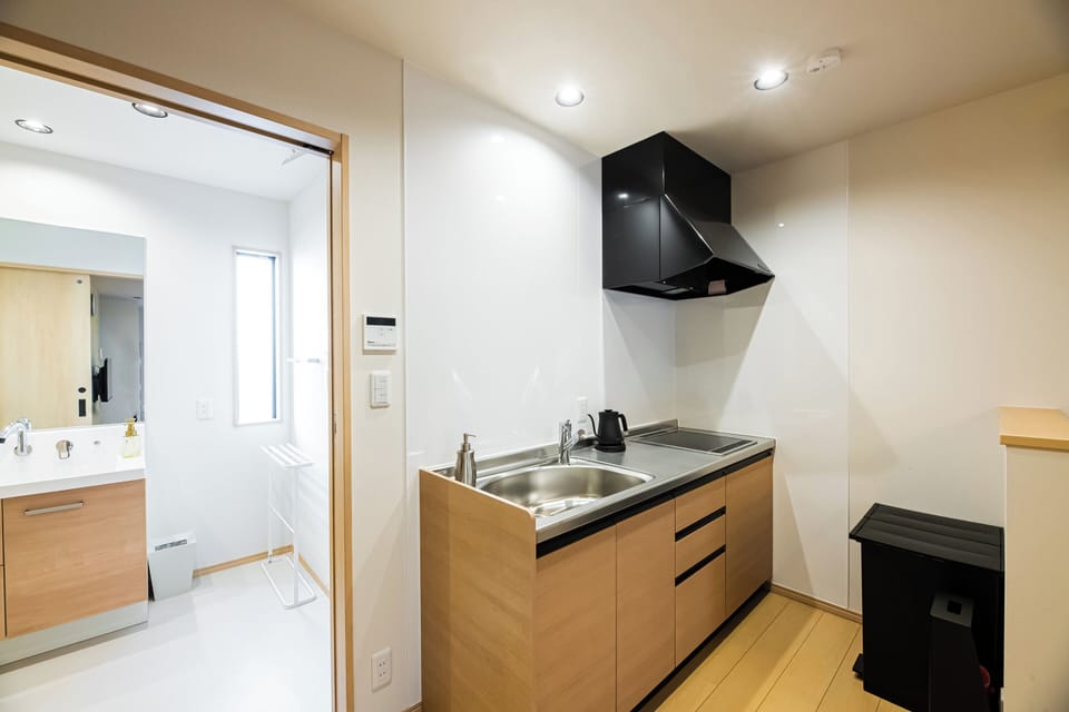 Villa | Private kitchen | Full-size fridge, microwave, cookware/dishes/utensils