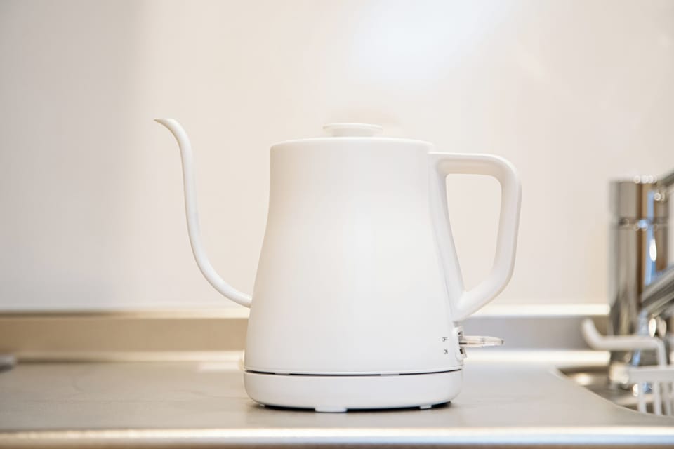 Villa | Private kitchen | Full-size fridge, microwave, stovetop, cookware/dishes/utensils