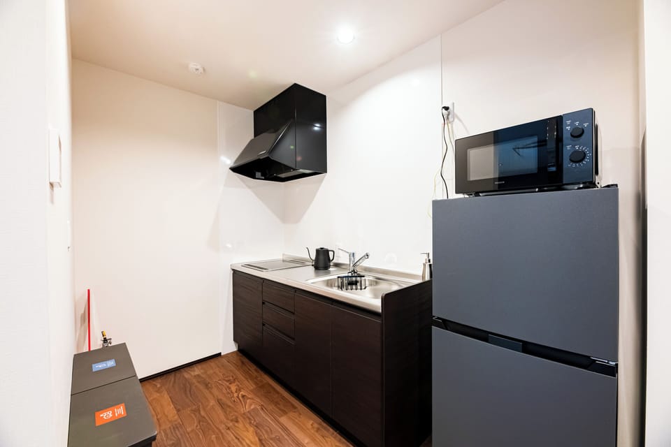 Villa | Private kitchen | Full-size fridge, microwave, stovetop, cookware/dishes/utensils