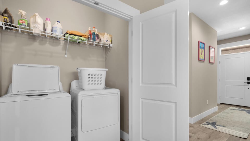 Your dedicated laundry space keeps your vacation wardrobe fresh with a full-size washer and dryer, plus convenient storage.