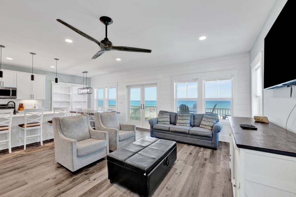 Each living room offers direct balcony access and stunning Gulf views