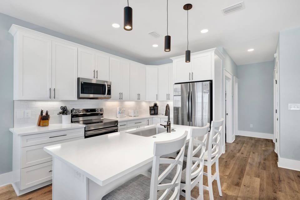 The kitchen is fully equipped and provides bar seating