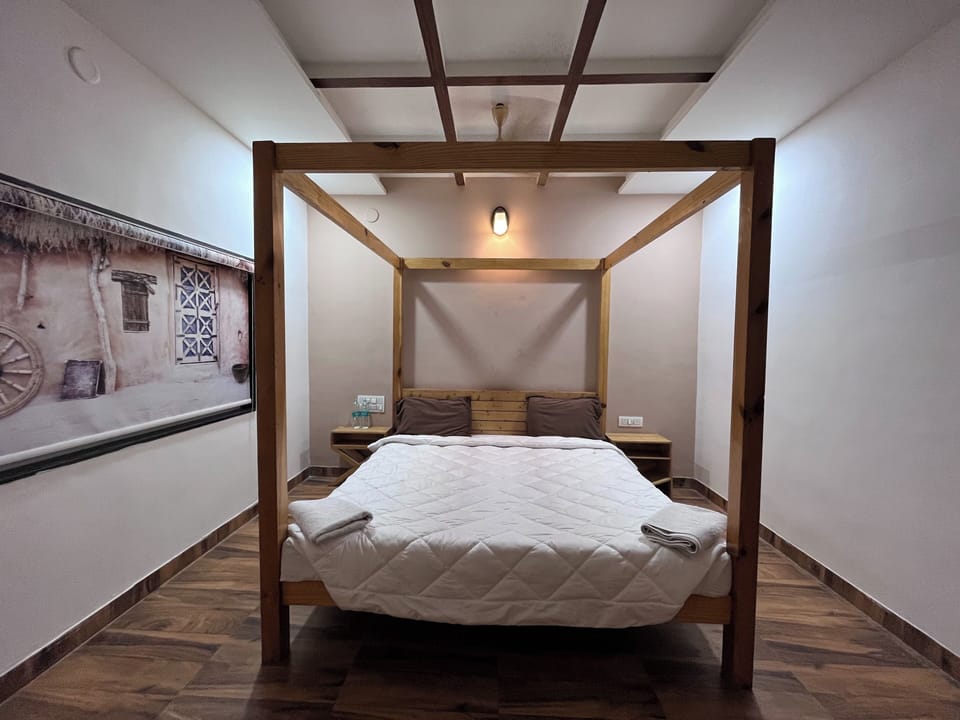Deluxe Room, Garden View | Individually furnished, desk, laptop workspace, bed sheets