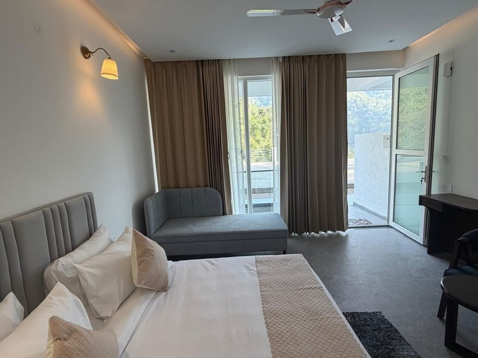 Executive Room, Balcony, Hill View | Soundproofing, iron/ironing board (on request), WiFi (free)