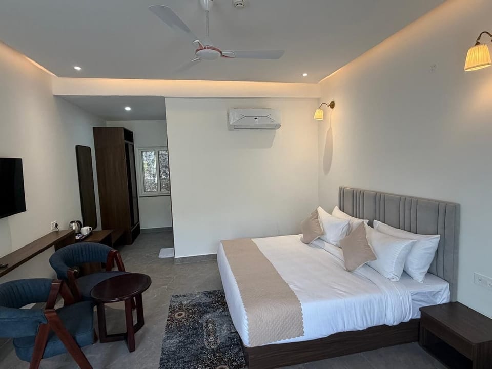 Executive Room, Balcony, Hill View | Soundproofing, iron/ironing board (on request), WiFi (free)