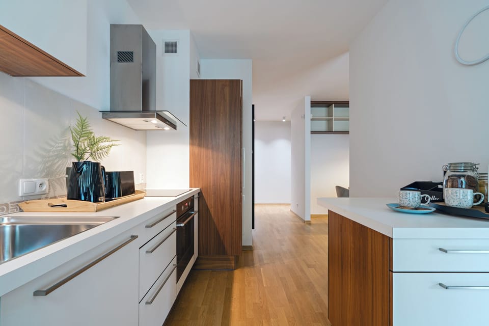 Family Apartment, 2 Bedrooms, Courtyard View | Private kitchen | Coffee/tea maker, electric kettle, toaster, highchair