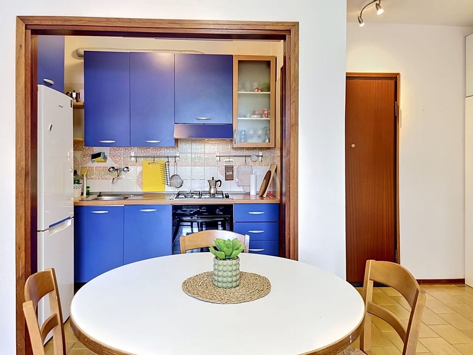 Furniture, Wood, Flooring, Interior Design, Floor, Room, Kitchen, Lighting, Kitchen & Dining Room Table, Major Appliance