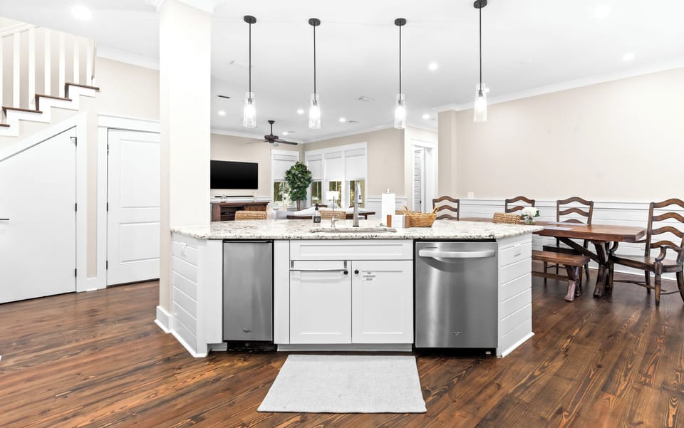 Your spacious open-concept kitchen flows effortlessly into dining and living areas, creating a warm hub for gathering and entertaining.