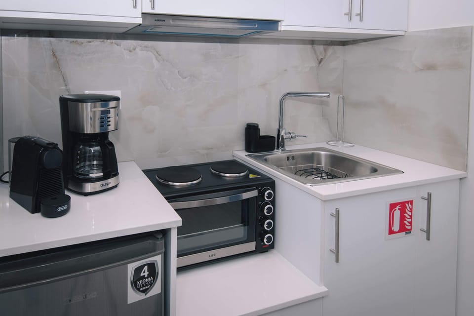 Compact modern kitchen fully equipped for your stay