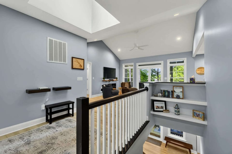 Great Room - 60-inch smart HDTV, electric fireplace, and comfortable seating for the whole crew.