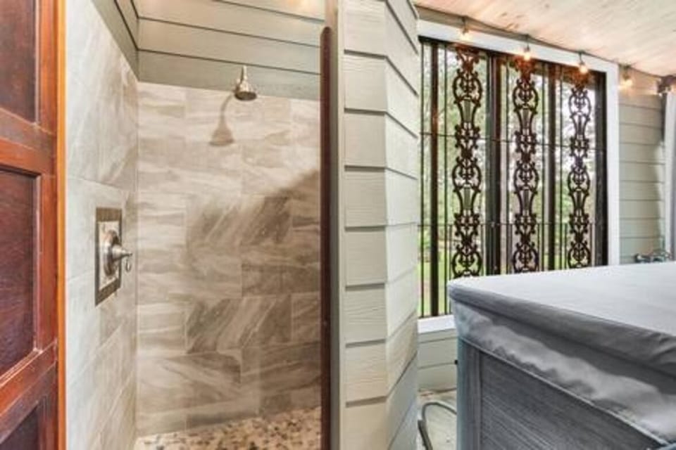 Shower in screened porch for hot tub