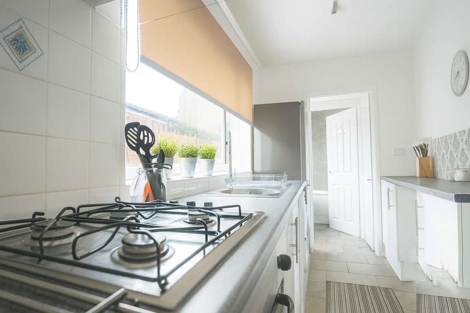A fully equipped kitchen designed for cooking, gathering, and creating delicious meals