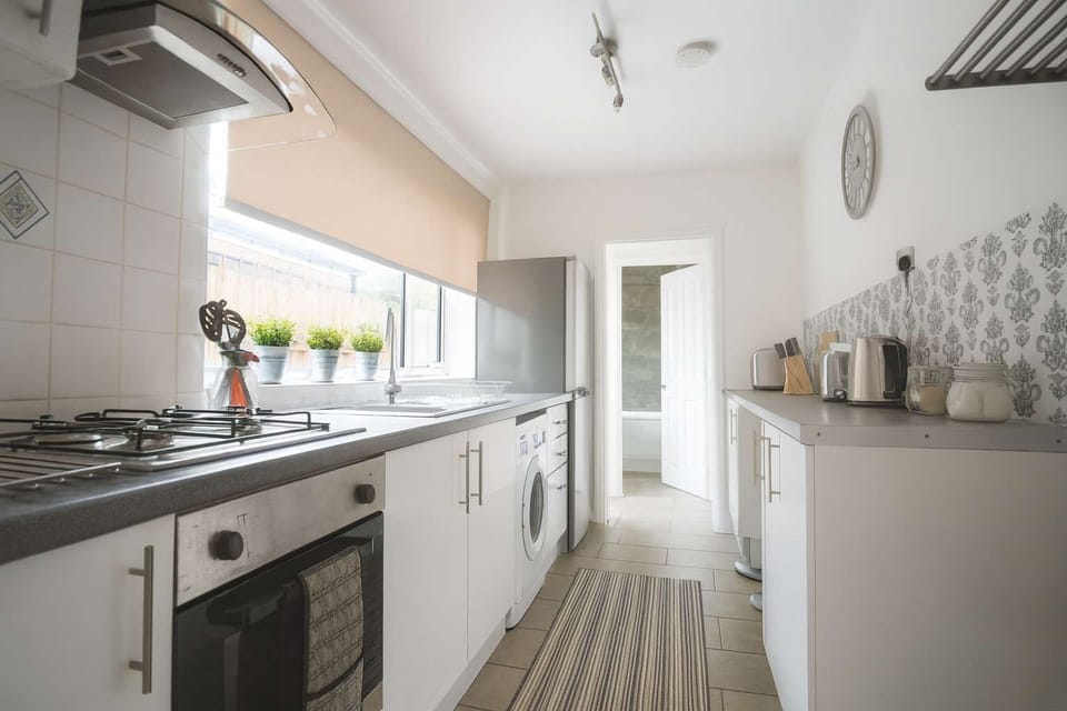 A fully equipped kitchen designed for cooking, gathering, and creating delicious meals