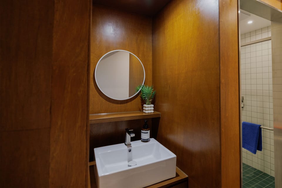 Comfort Quadruple Room, 2 Queen Beds, Non Smoking | Bathroom | Shower, free toiletries, hair dryer, slippers