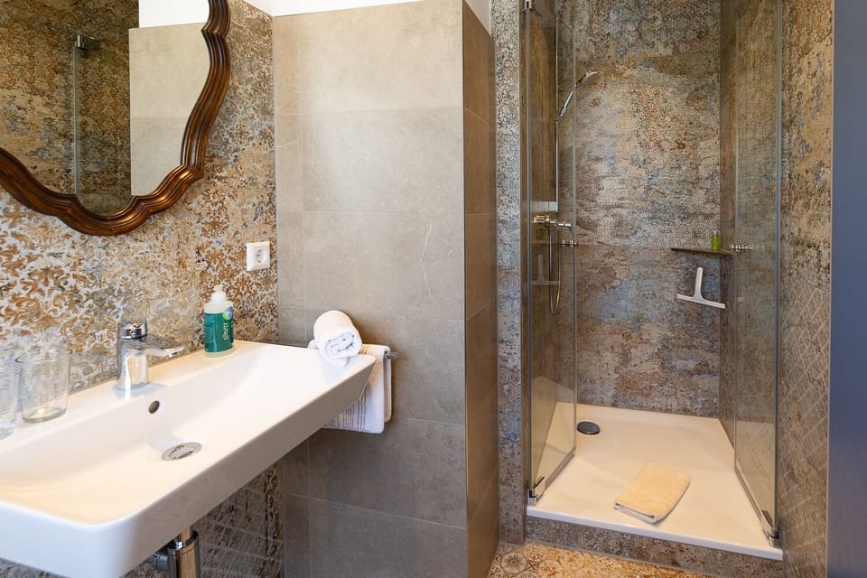 Double Room | Bathroom | Shower, eco-friendly toiletries, hair dryer, towels