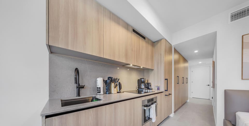 Condo, Balcony, City View | Private kitchen | Fridge, microwave, stovetop, dishwasher