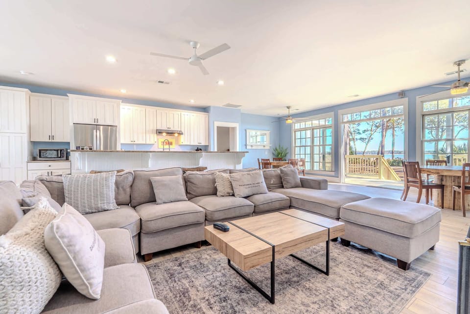 Coastal luxury awaits at 152 Ave of Oaks — where sun-drenched open living spaces, water views, and effortless elegance redefine your Hilton Head escape. Your private retreat starts here.