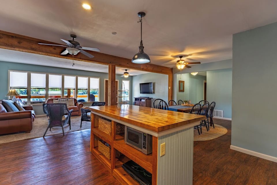 kitchen overlooking the dining table and living room
