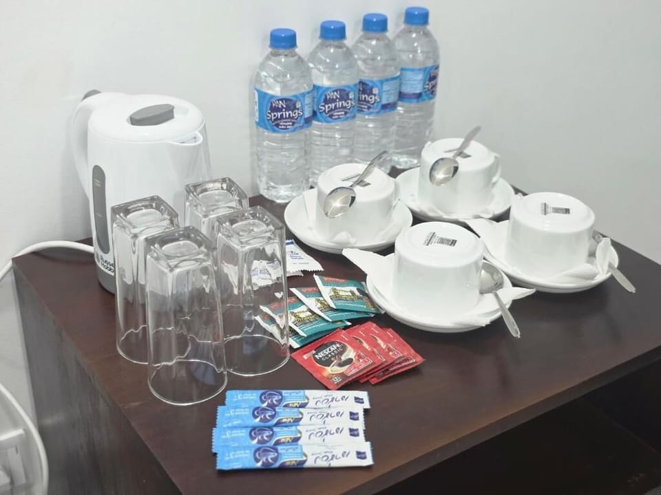 Deluxe Double Room, Garden View | Coffee and/or coffee maker