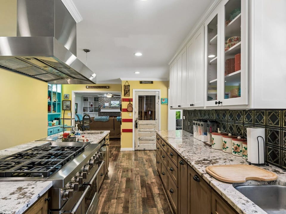 Well stocked kitchen with ice maker, double fridge, large stove