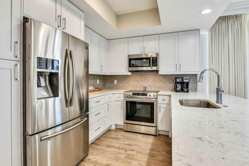 Condo, Multiple Beds (Silver Beach Towers 102W- Southern He) | Private kitchen