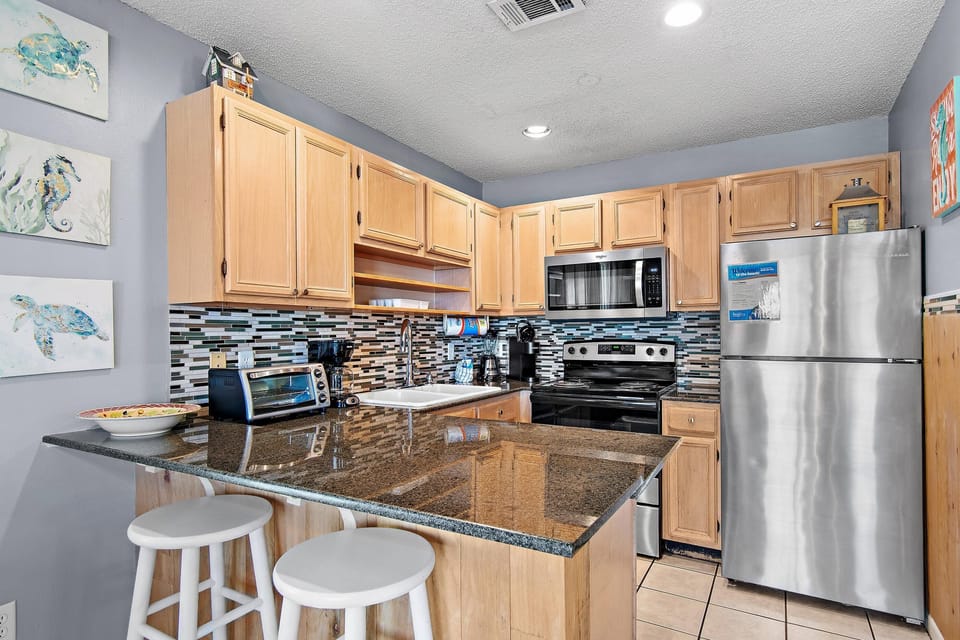 Condo, 1 King Bed with Sofa bed (Summerspell 110) | Private kitchen | Oven, electric kettle, toaster