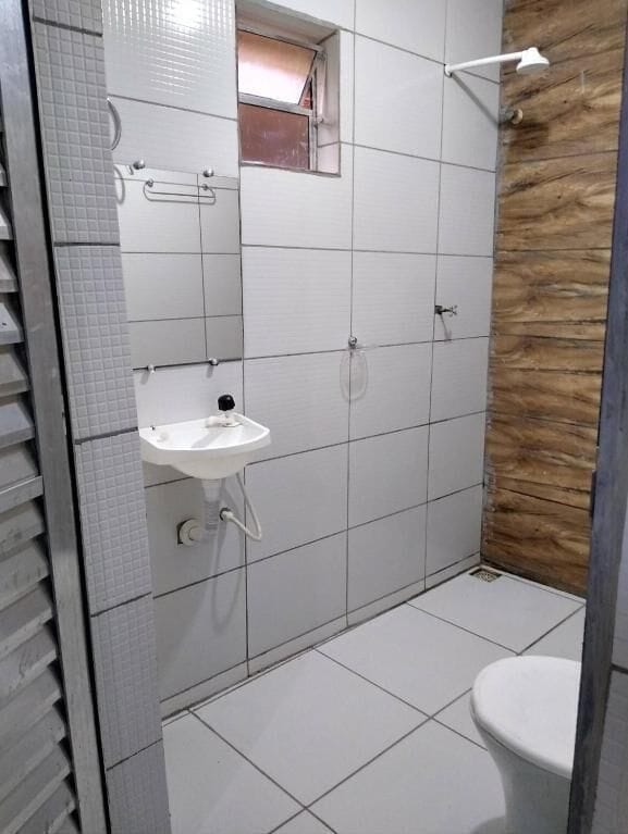 Economy Triple Room, Private Bathroom | Bathroom | Shower, towels, toilet paper