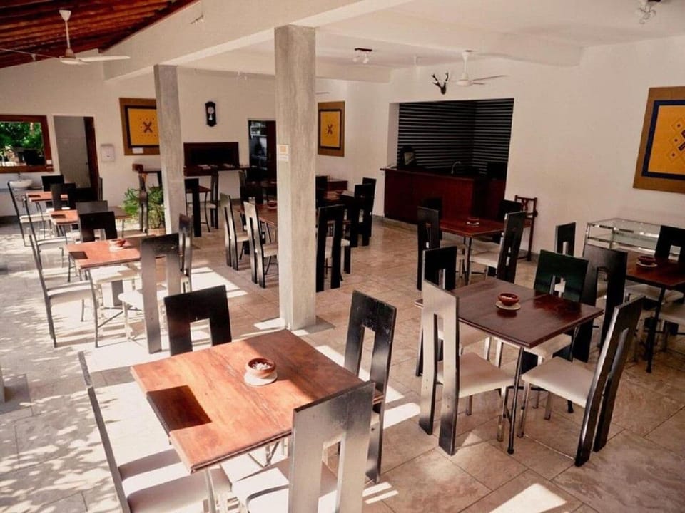 Deluxe Double Room, Balcony, Pool View | Dining