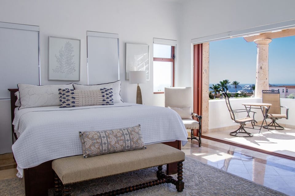 Master bedroom with a King size bed and direct access to a private terrace.