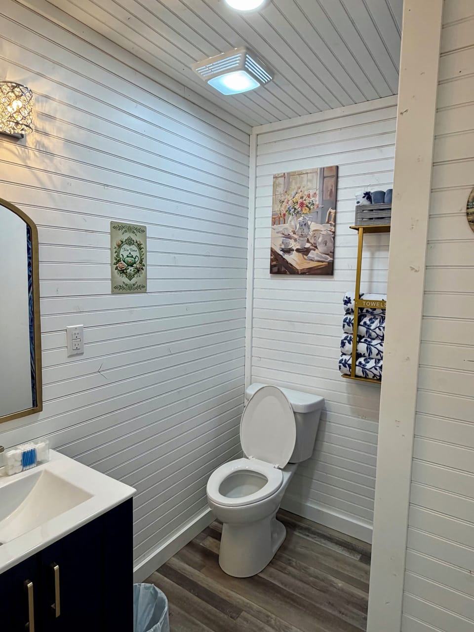 Full bathroom with a walk-in shower.
