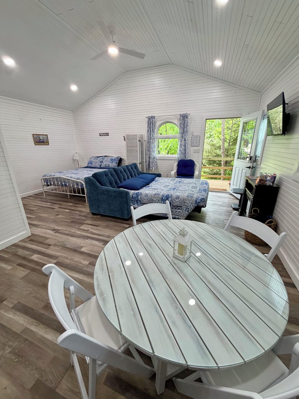 Living room with the couch converted into the bed