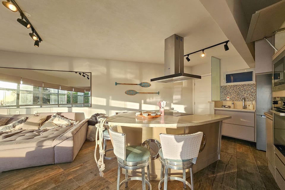 Luxury Apartment | Private kitchen | Full-size fridge, microwave, oven, stovetop