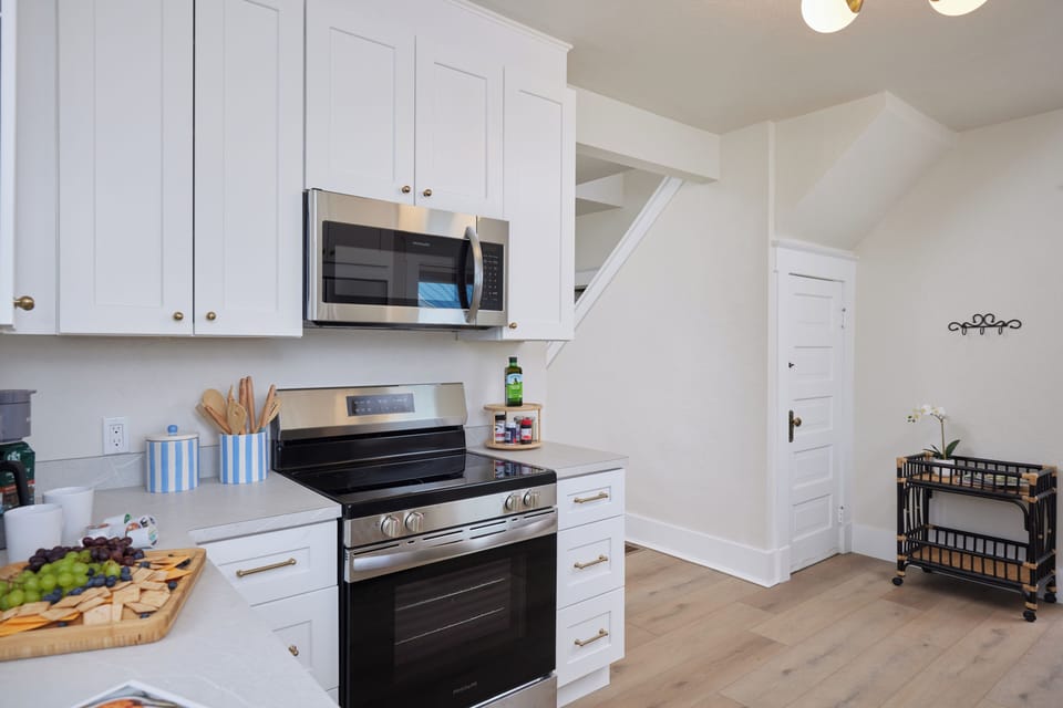 Full-size stainless appliances, a dishwasher, and pantry basics already here. One guest called it "extremely well stocked" — it cooks a holiday dinner, not just a reheat.