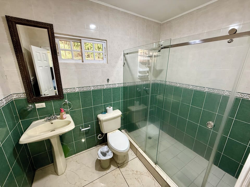 Economy Room, Patio | Bathroom | Shower, towels, soap, toilet paper