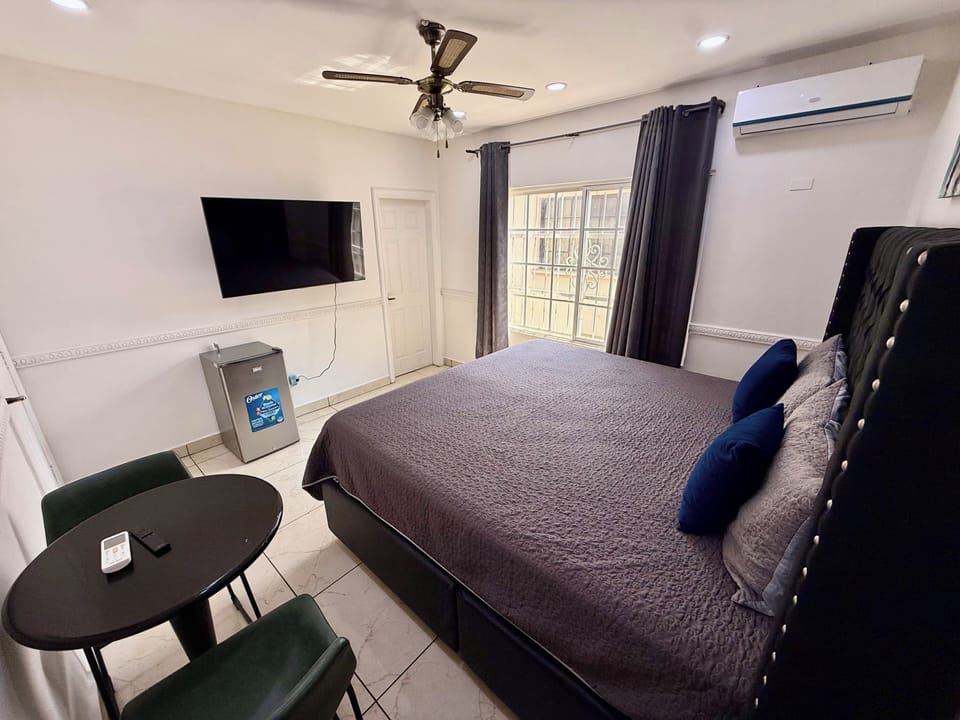 Luxury Room | Down comforters, iron/ironing board, WiFi (free), bed sheets