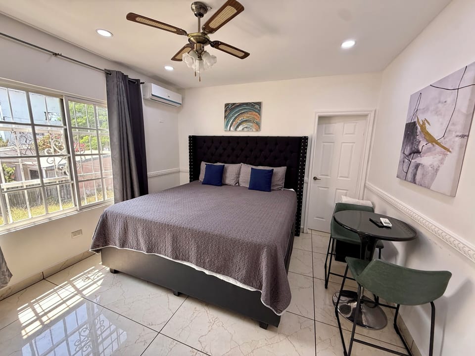 Luxury Room | Down comforters, iron/ironing board, WiFi (free), bed sheets